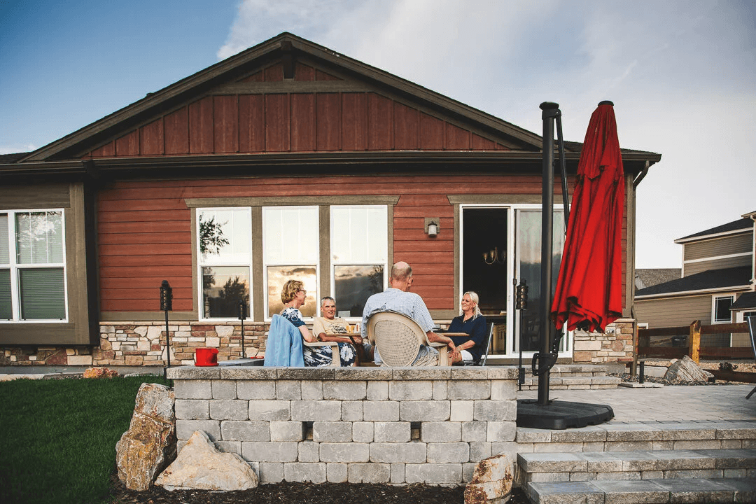 Custom concrete gunite pool with outdoor living space in Erie, Colorado